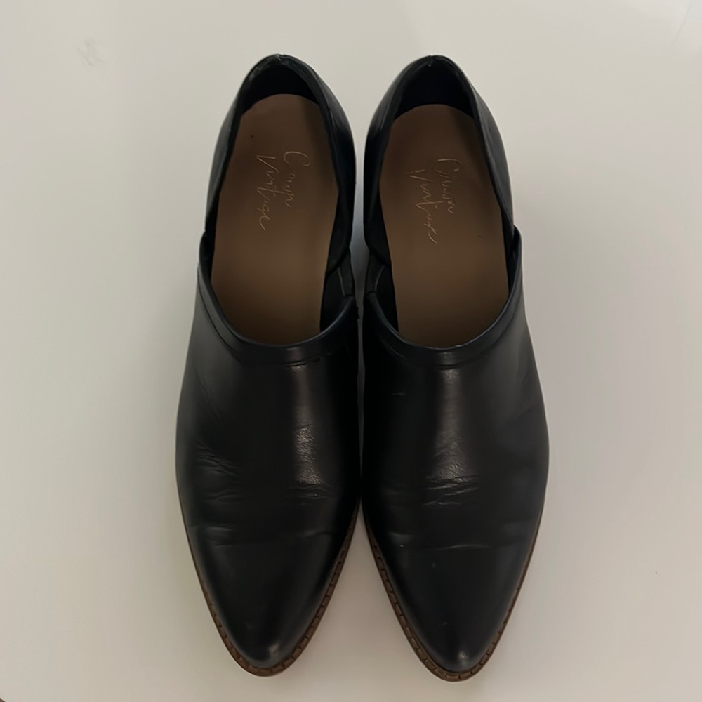 Black, heeled loafers.